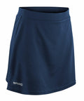 A navy blue athletic skirt featuring the "SPIRO" logo at the bottom left, known as the S261F from Spiro.