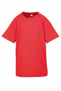 The Spiro S287J, a plain red short-sleeved t-shirt featuring a simple, classic cut, is displayed against a white background.
