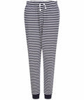 The SFM86 pants by Skinnifit feature a black and white striped design, complete with a drawstring waist and ribbed cuffs.