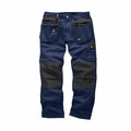 Scruffs SH054 work pants in dark blue feature multiple pockets and black knee patches.