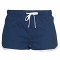Navy blue athletic shorts with white trim and a white drawstring waistband from Skinnifit, model SK069, showcased against a plain white background.