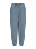The SF Minni SM430 sweatpants feature a blue color with an elastic waistband and adjustable drawstring. Designed with a relaxed fit, these pants include elastic cuffs at the ankles for a casual and comfortable appearance.