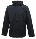 A product image showcasing the SN100 jacket from Regatta Professional. It is plain black, set against a white backdrop, featuring a high collar and long sleeves. The front closure is likely zippered, hidden beneath a flap, maintaining its simple and unembellished design.