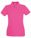 The SS505 by Fruit of the Loom is a vibrant pink polo shirt with short sleeves and a classic collar. It incorporates a three-button placket and is showcased against a plain white background.