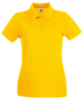 The Fruit of the Loom SS505, a bright yellow polo shirt featuring short sleeves and a three-button placket, is showcased against a white background.