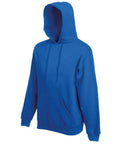 The SS824 by Fruit of the Loom is a vibrant blue hoodie featuring long sleeves and a front pouch pocket. The hood is up, with drawstrings hanging down from the neckline, showcasing its comfortable and casual design.