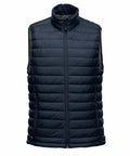 A Stormtech ST015 in dark blue with a full-length front zipper and a high collar.