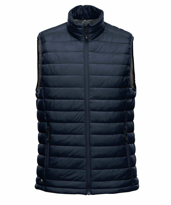 A Stormtech ST015 in dark blue with a full-length front zipper and a high collar.