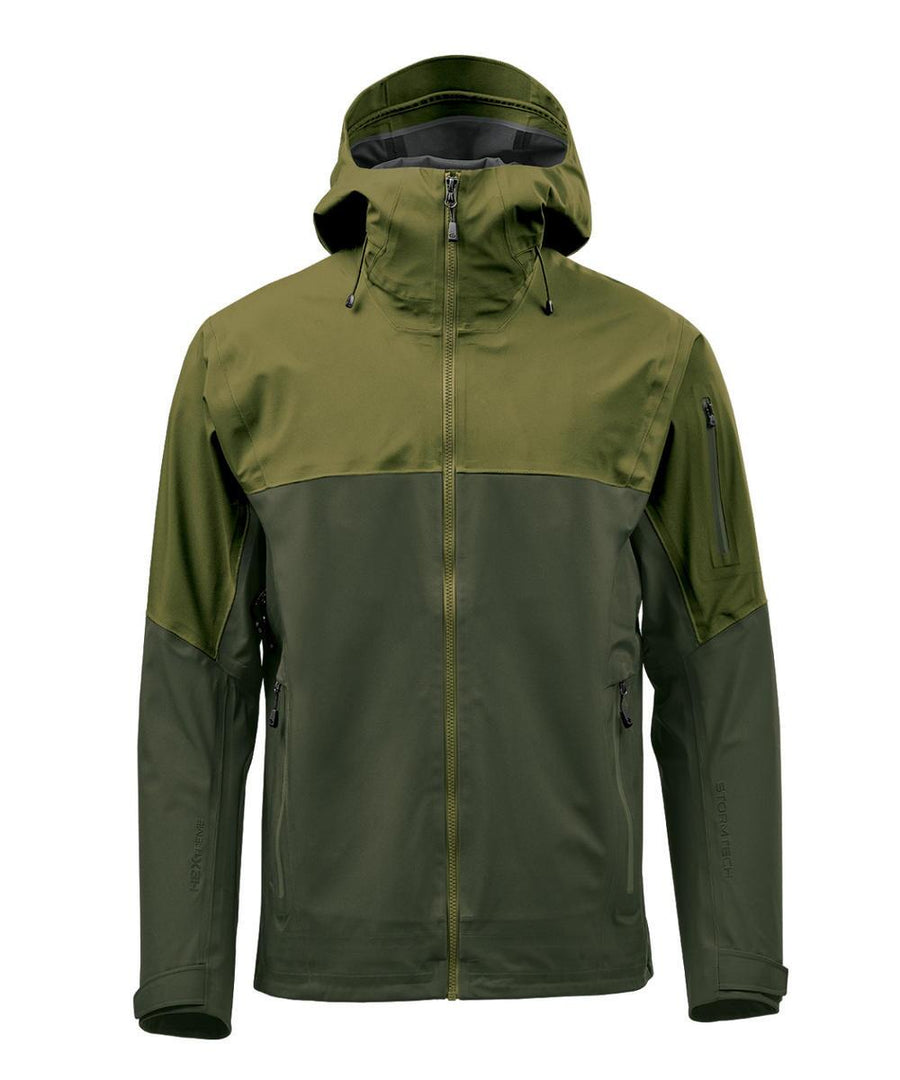The Softshells jacket features a two-tone green design, hood, full front zip, high collar, long sleeves, two zipped side pockets, and a zipped pocket on the upper left sleeve.