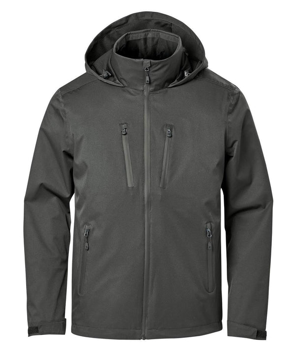 The Softshells jacket is dark grey with a hood, front zip, two vertical zipped chest pockets, two zipped hand pockets, adjustable wrist cuffs, and a high collar.