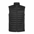 The Stormtech ST158 is a black quilted puffer vest featuring a stand-up collar, sleeveless design, and front zipper closure.