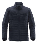 The Stormtech ST175 is a black puffer jacket featuring a front zipper and standing collar.