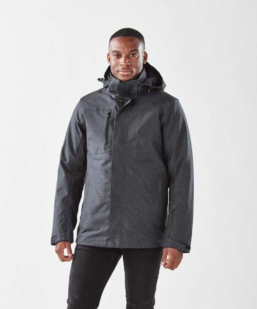 A black hooded insulated jacket with a high collar, zipper closure, and additional snap buttons. The ST176 by Stormtech has long sleeves and a smooth exterior finish.