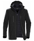 The Stormtech ST179 is a black multi-layer jacket with a hood, featuring a front zipper and two chest pockets.