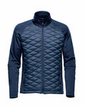 A Stormtech quilted jacket in blue, featuring a high collar and front zipper, model ST195.