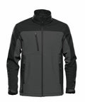 The Stormtech ST197 softshell jacket features a dark grey and black design, equipped with a high collar, zipper closure, and three front zippered pockets.