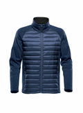 Stormtech ST198: A navy zip-up jacket featuring a quilted front and fleece sleeves.