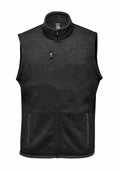 Dark gray ST206 fleece vest by Stormtech, featuring a front zipper and three pockets—one on the chest and two at the waist.