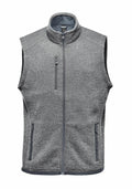 The Stormtech ST206 is a gray zip-up sleeveless vest featuring a high collar and three front pockets.