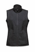 The Stormtech ST207 is a dark gray, sleeveless zip-up vest featuring a standing collar and two zipped pockets.