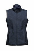The Stormtech ST207 is a sleeveless, dark gray vest featuring a full front zipper and two side pockets.