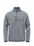 The Stormtech ST208 is a gray pullover featuring a high collar, quarter-zip, and chest pocket.