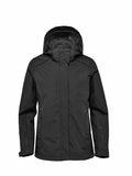 The Stormtech ST219 black hooded jacket, featuring a front zipper and long sleeves, is showcased against a white background.