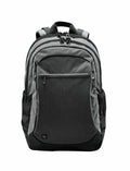 The Stormtech ST220 backpack is gray with multiple zippered compartments, featuring black accents on the bottom and sides, and comes with adjustable shoulder straps.