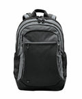 A gray Stormtech ST220 with multiple compartments, black zippers, and a front pocket. It has a handle on top and padded shoulder straps.