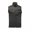 Product Data: A dark gray ST223 puffer vest by Stormtech featuring a front zipper, high collar, and sleeveless design.