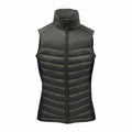 The ST224 by Stormtech is a sleeveless quilted puffer vest in dark green, featuring a high collar and front zipper.