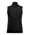 The Gilets & Body Warmers is a sleeveless black softshell gilet with a high collar, front zip, and three zipped pockets—one chest and two waist. The fabric is smooth and slightly shiny.