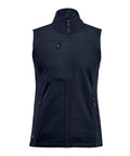 The Gilets & Body Warmers is a sleeveless navy blue zip-up waistcoat with a high collar, zipped chest pocket, and two zipped hand pockets, shown against a plain white background.