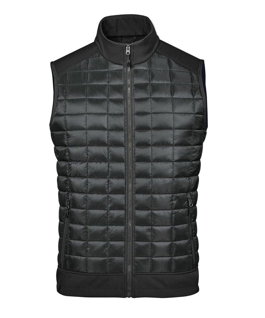 The Gilets & Body Warmers is a black quilted sleeveless waistcoat featuring a front zip, stand-up collar, and two zipped side pockets, shown against a white background.