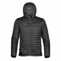 Stormtech's ST803 black puffer jacket features a hood and multiple zippered pockets, showcased against a plain background.