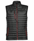 Stormtech ST805 black puffer vest with red zippers, standing collar, and multiple pockets, shown against a white background.