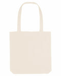 A beige tote bag, identified as product SX061 by Stanley/Stella, features two long handles and a straightforward design, displayed against a white background.