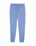 Introducing the SX100 jogger pants by Stanley/Stella, featuring a light blue design with an elastic waistband and drawstring. These pants boast side pockets and fitted cuffs at the ankles, crafted from soft and comfortable fabric for ultimate ease.