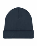 The Stanley/Stella SX146 is a dark blue knitted beanie featuring a folded brim.