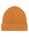 Stanley/Stella's SX147, an orange knit beanie with a folded brim, is displayed on a white background.