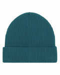 The SX147 by Stanley/Stella is a teal ribbed knit beanie featuring a folded brim, showcased against a white background.