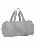 Stanley/Stella SX162, a gray cylindrical duffel bag featuring handles and a shoulder strap, resting against a white background.