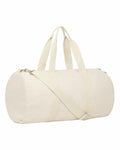 The Stanley/Stella SX162 is a beige cylindrical duffel bag featuring two short handles and an adjustable shoulder strap.