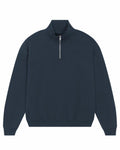 The Stanley/Stella SX216 is a dark quarter-zip sweater featuring a high collar, long sleeves, and ribbed cuffs and hem. It has a centrally positioned visible zipper down the front, and the fabric is soft with a subtle texture.