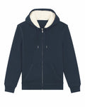 The SX222 by Stanley/Stella is a navy blue zip-up hoodie with a white fleece lining, featuring a drawstring hood, front pockets, and ribbed cuffs and hem.