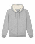 The "SX222" by Stanley/Stella is a gray zip-up hoodie characterized by a lined hood and drawstrings. It includes a front zipper and two pockets, with a soft texture visible inside the hood, offering a minimalist and casual design.