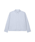A light blue, long-sleeved shirts product with a collar and button-up front, featuring a relaxed, slightly boxy fit and buttoned cuffs, displayed on a plain white background.