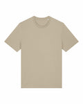 A plain Stanley/Stella SX701 t-shirt is laid flat on a white background. This beige shirt features short sleeves and a crew neckline, highlighting its simple design and neutral color.