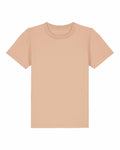 The SX702 by Stanley/Stella is showcased against a white background, highlighting its light beige color. The T-shirt features a classic crew neck and short sleeves.