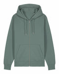The SX712 by Stanley/Stella, a green zip-up hoodie, is displayed. It features a hood with drawstrings, a full-length zipper on the front, and two large pockets. The fabric looks soft and comfortable, perfect for casual wear.